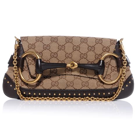 gucci horsebit clutch for sale|Gucci monogram horsebit clutch.